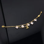 [Limara]LOGO 6 MOTIF STAR AND SUN GOLD BRACELET